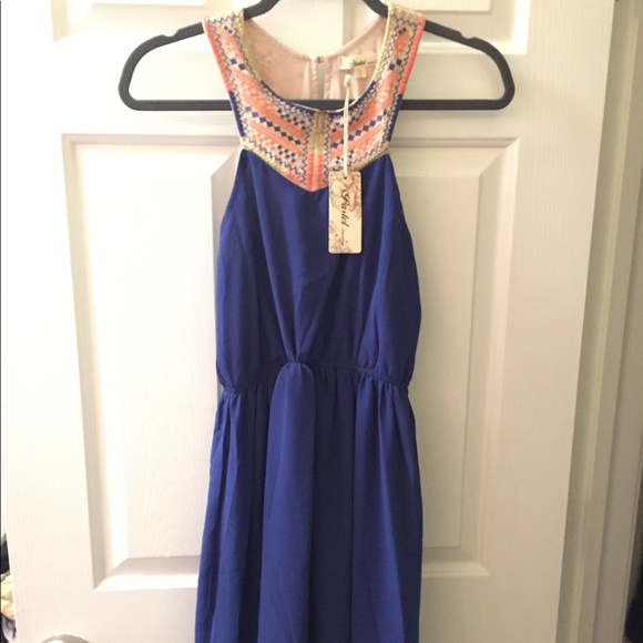 Pastels Clothing Dresses & Skirts - Blue dress with tribal embroidered neckline